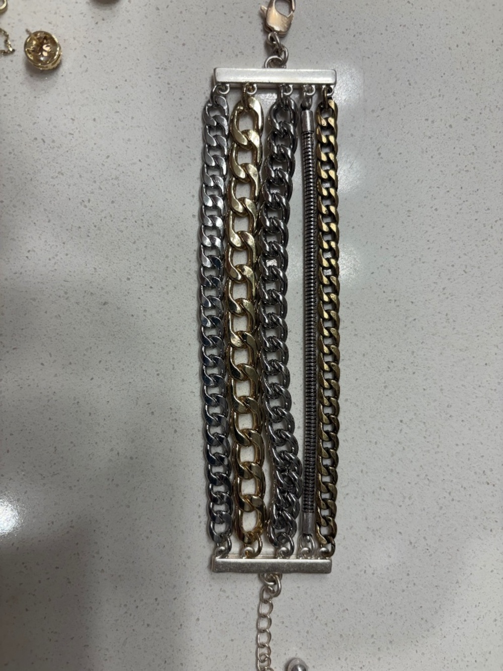two-tone multi-chain statement bracelet,